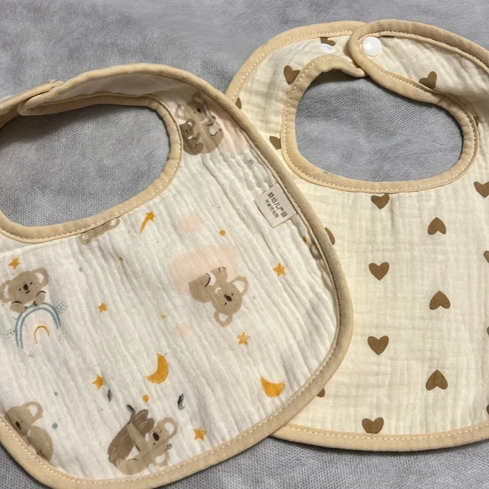 six Muslin bibs
